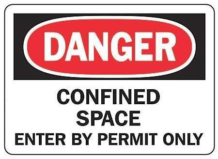 white and red sign saying Danger confined space enter by permit only